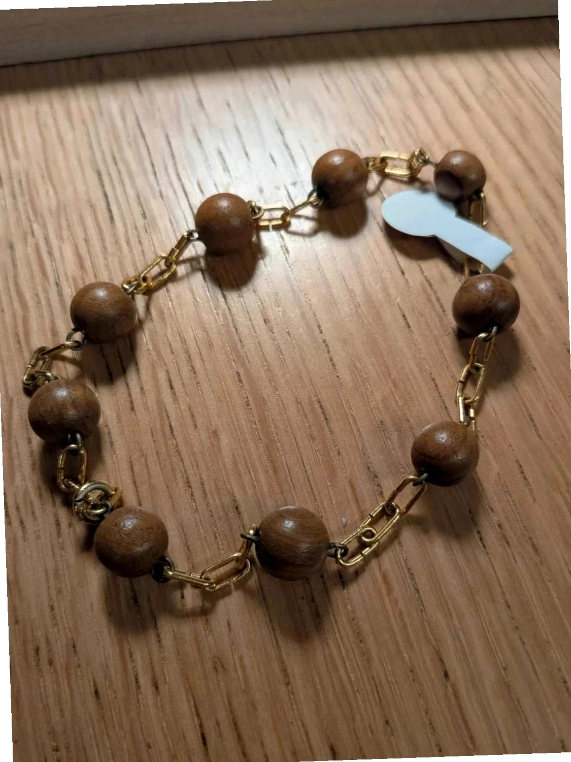Bracelet van bosbes hout. Bruin / goud – photo 2
